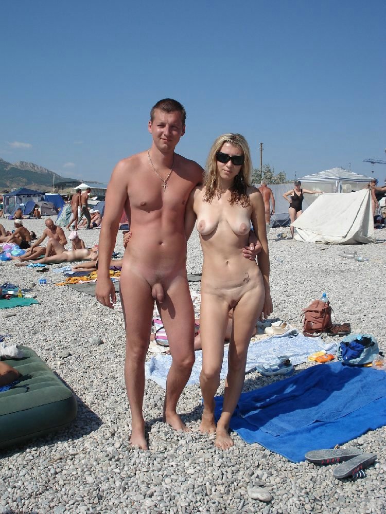 750px x 1000px - Nudist Couple Posing for the Photo Camera at Beach